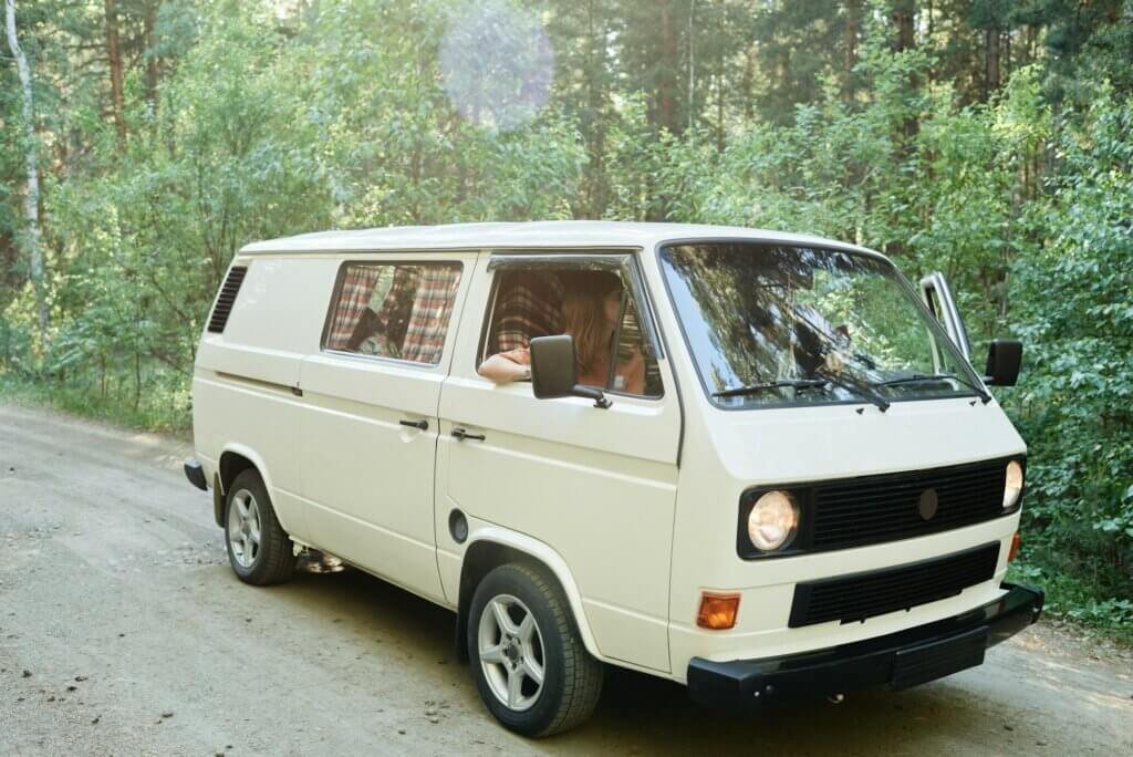 People travelling by van